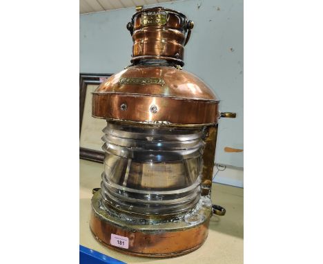 A 19th century ship's masthead lantern in copper and brass, by William Jones, London, 48cm.&nbsp;&nbsp;No burner, glass appea