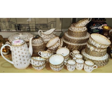 A Spode Fleur-de-Lys Gold dinner and tea service, 70 pieces approx 