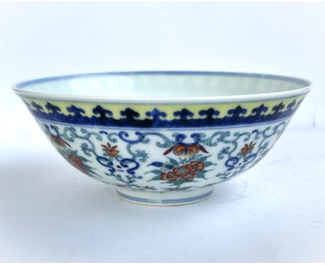 A Chinese famille vert bowl with decoration of scrolling flowers, similar interior, seal mark to base. diameter 15cm  additio