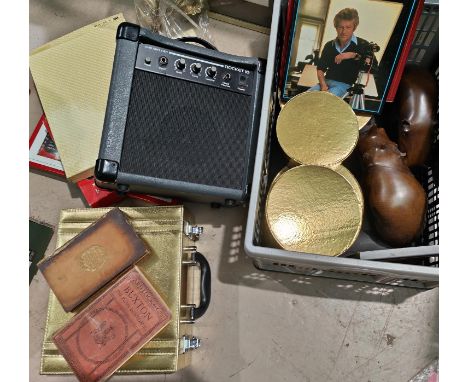 A small travel guitar amp, a book on guitar playing, signed book etc 
