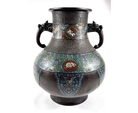 A large Chinese bronze and Cloisonne vase with floral decoration, animal handles, seal mark to base, ht.36cm 