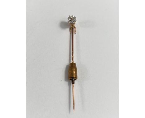 A yellow metal stick pin set old cut diamond, approx diameter 5mm 