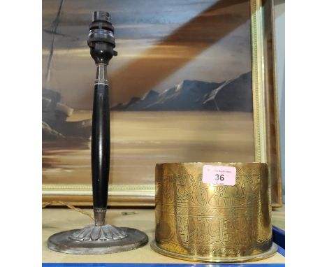 A WWI large shell case; an Art Nouveau table lamp 