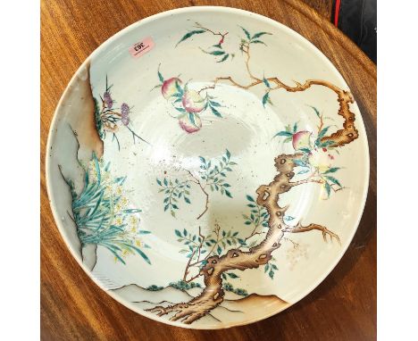 A large&nbsp; and impressive 19th century Chinese charger decorated with branches and pomegranates to top, mountain scenes un