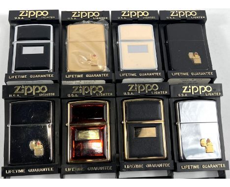 Eight various Zippo lighters:&nbsp; 4 regular model 35 black elegance, golden tortoise 355 ultralite back and ultralite ivory