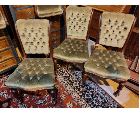 A set of six early 19th century dining chairs with deeply button back green upholstery, carved tapering legs&nbsp; 