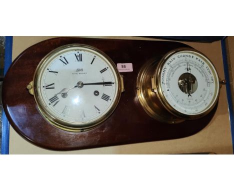 A modern ship's clock and barometer on mahogany plaque 