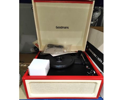 A Goodmans RETRO record player in orange and cream, record cleaners 