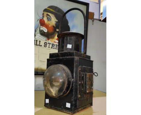 A 19th century railway lamp in japanned black metal 