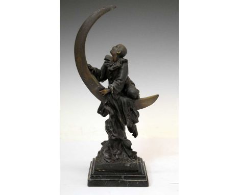 Bronzed figure of 'Pierrot on the moon', signed A. Colinet to base, raised on black step marble base, 33cm high