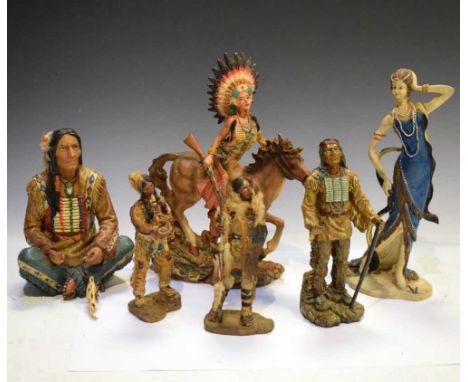 Group of resin native American figures, 28cm high and smaller, plus Art Deco style lady