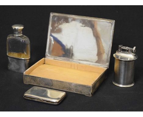 George VI silver tabletop box with engine-turned decoration and hinged lid, Birmingham 1938, a silver cigarette lighter, ciga