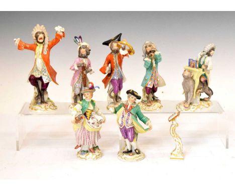 Five Meissen monkey orchestra figures, modelled after Joachim Kandler (1706-1775), together with a music stand and two late 1