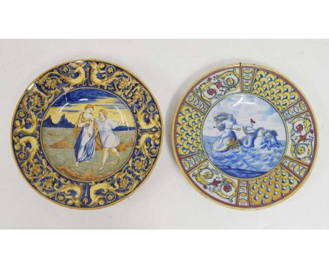 Two Maiolica chargers, one depicting a courting couple, the other Poseidon, 35cm