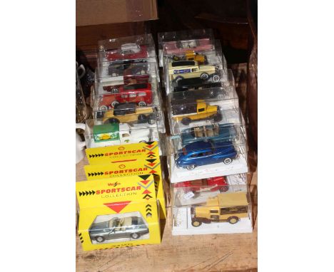 Assortment of boxed Diecast model cars.