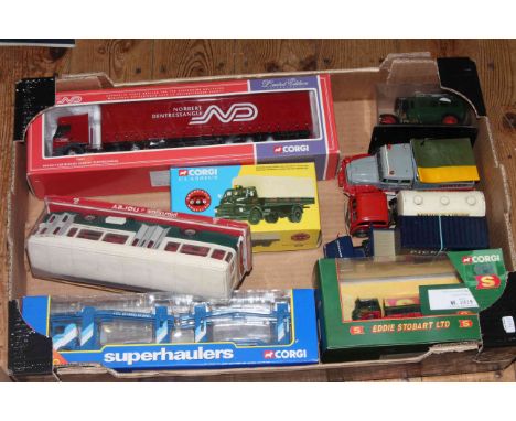 Collection of model commercial vehicles and bus.