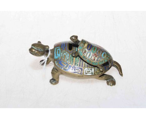 Small brass tortoise with enamel decoration.