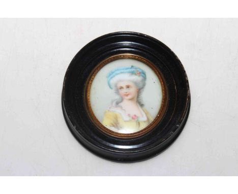 Small oval portrait miniature in ebonised frame.