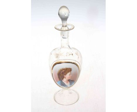 Victorian glass decanter with painted portrait panel.