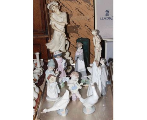 Five various Lladro figures, two Nao ducks, Guiseppe Armani and Capo di Monte figures.