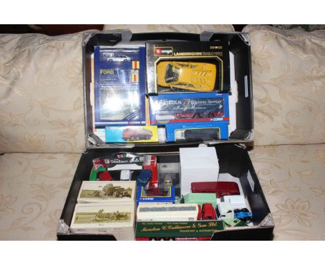 Two boxes of Corgi, Atlas, Burago and other model vehicles.