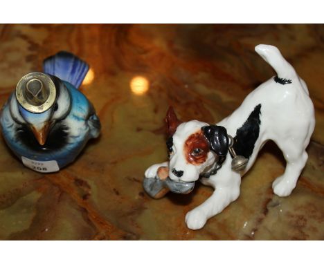 Due sculturine in porcellana raffiguranti un cagnolino Royal Dulton e uccellino Goebel Germania