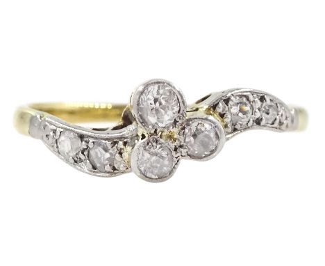Early 20th century three stone old cut diamond cluster ring, with diamond set shoulders, stamped 18ct PT, total diamond weigh