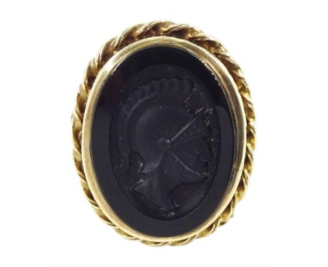 9ct gold black onyx intaglio ring, depicting a Roman Centurion, London 1974Condition Report:Approx 11.3gm, size M-N, max dept