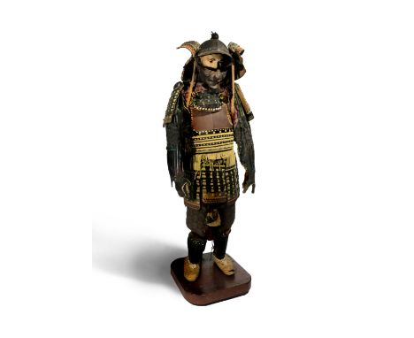 A JAPANESE COMPOSITE ARMOUR, GUSOKU EDO 1615-1868 The five-plate kawari kabuto helmet topped with a dragon emerging from scro