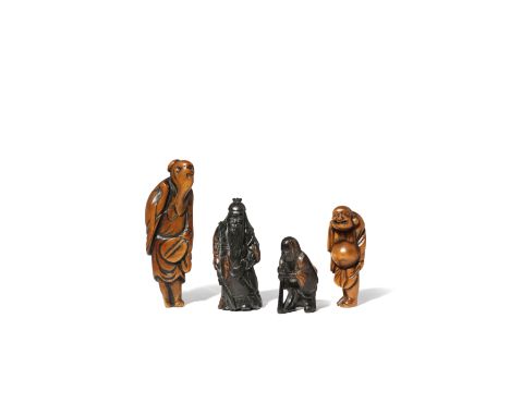 FOUR JAPANESE WOOD NETSUKE EDO AND MEIJI PERIOD Two in light-coloured sandalwood, one depicting a tall sennin with a coat of 