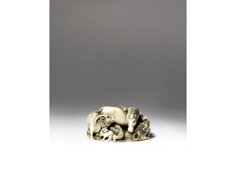 λ A JAPANESE IVORY NETSUKE MEIJI 1868-1912 Depicting the Twelve Zodiac animals compactly interwoven, with details realistical