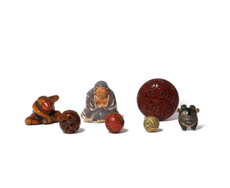 A SMALL COLLECTION OF JAPANESE MINIATURE PIECES MEIJI 1868-1912 Including: three netsuke, one in pottery depicting Daruma wit