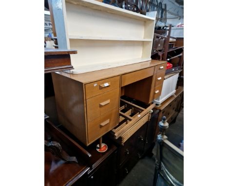 A mixed lot of furniture comprising 1920s mahogany sideboard, mid 20th century light oak dressing table, painted bookcase and