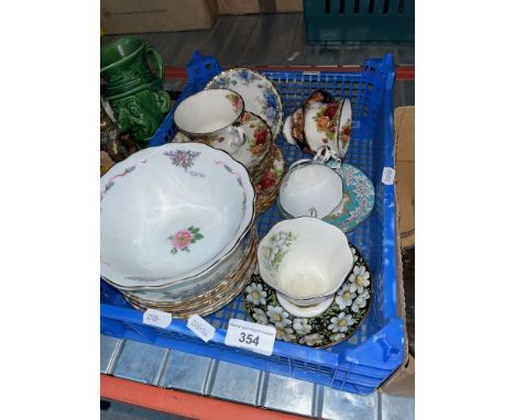 23 pieces of Royal Albert bone china including Old Country Roses, Enchantment and Moonlit Rose, an Art Deco Myott jug/vase, C