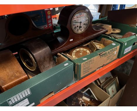 Four boxes of assorted clocks, clock parts and vintage radios. 