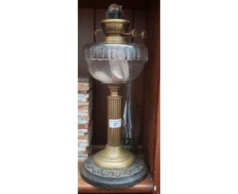 A brass column stem oil lamp with glass bowl and funnel 