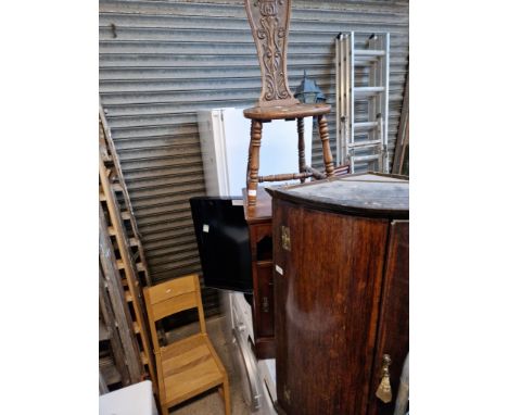 A mixed lot comprising Georgian oak corner cabinet, carved oak spinning chair, a mahogany bedside cabinet and spice rack, and