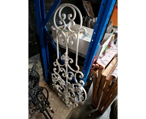 A large wrought iron decorative panel.