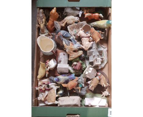 A box of assorted ceramics to include Midwinter, wade, lilliput lane cottages, Beswick 