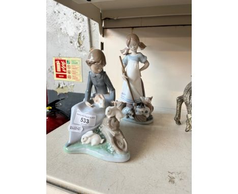 A Lladro figurine and a Nao figurine. 