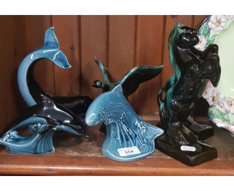 3 items of Poole pottery - whale, salmon and dolphin together with 3 pieces of Canadian Blue Mountain pottery 