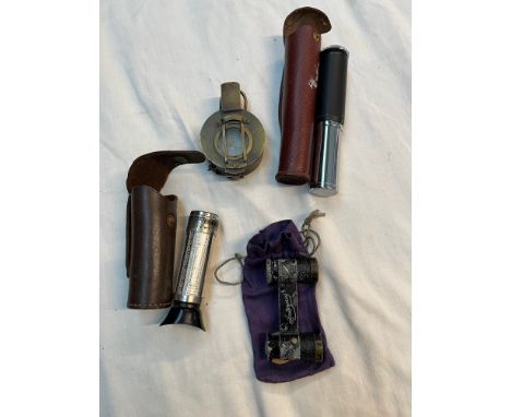 A collection of instruments to include Stanley 1920 marching compass, a Leica light meter and a vintage calculator etc. 