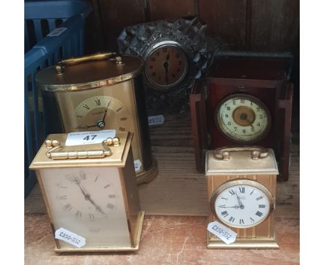 Various brass carriage clocks, Imhof, H Samuel &amp; Astral together with an Art Deco glass mantle clock. 