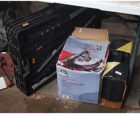 A Keter power tool table, power saw and a grinder/car polisher. 