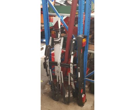 A Thule towbar 2 bike carrier with lighting board 