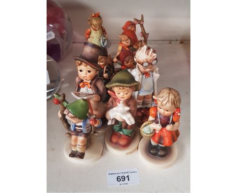 Ten West German Goebel figurines. 