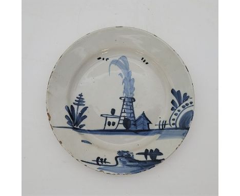 An 18th century English Delftware plate, painted in blue, diameter 20.5cm.Condition note: loss of glaze to rim, chip to rim u