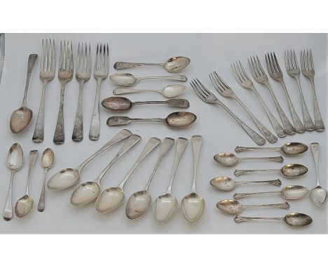 A quantity of silver flatware, various patterns and makers, to include, seven George IV old English pattern silver dessert fo