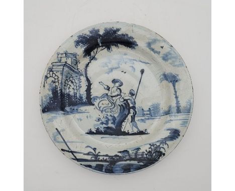 An 18th century English Delftware plate, painted in blue, diameter 20.6cm.Condition note: loss of glaze to rim, chip to under