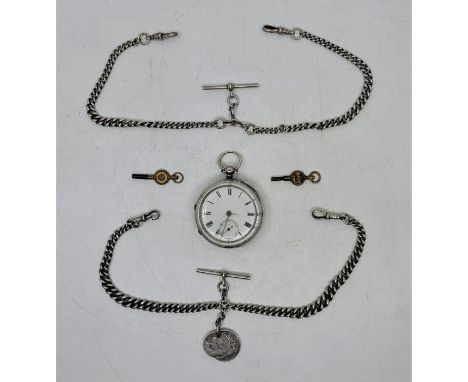 A Victorian silver open faced pocket watch, key wind, having white enamel Roman numeral dial and subsidiary Arabic numeral se